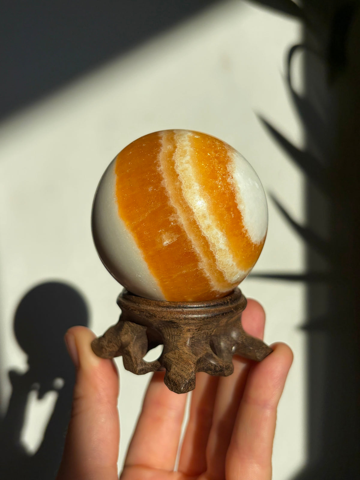 55mm Yellow Banded Calcite Sphere with stand