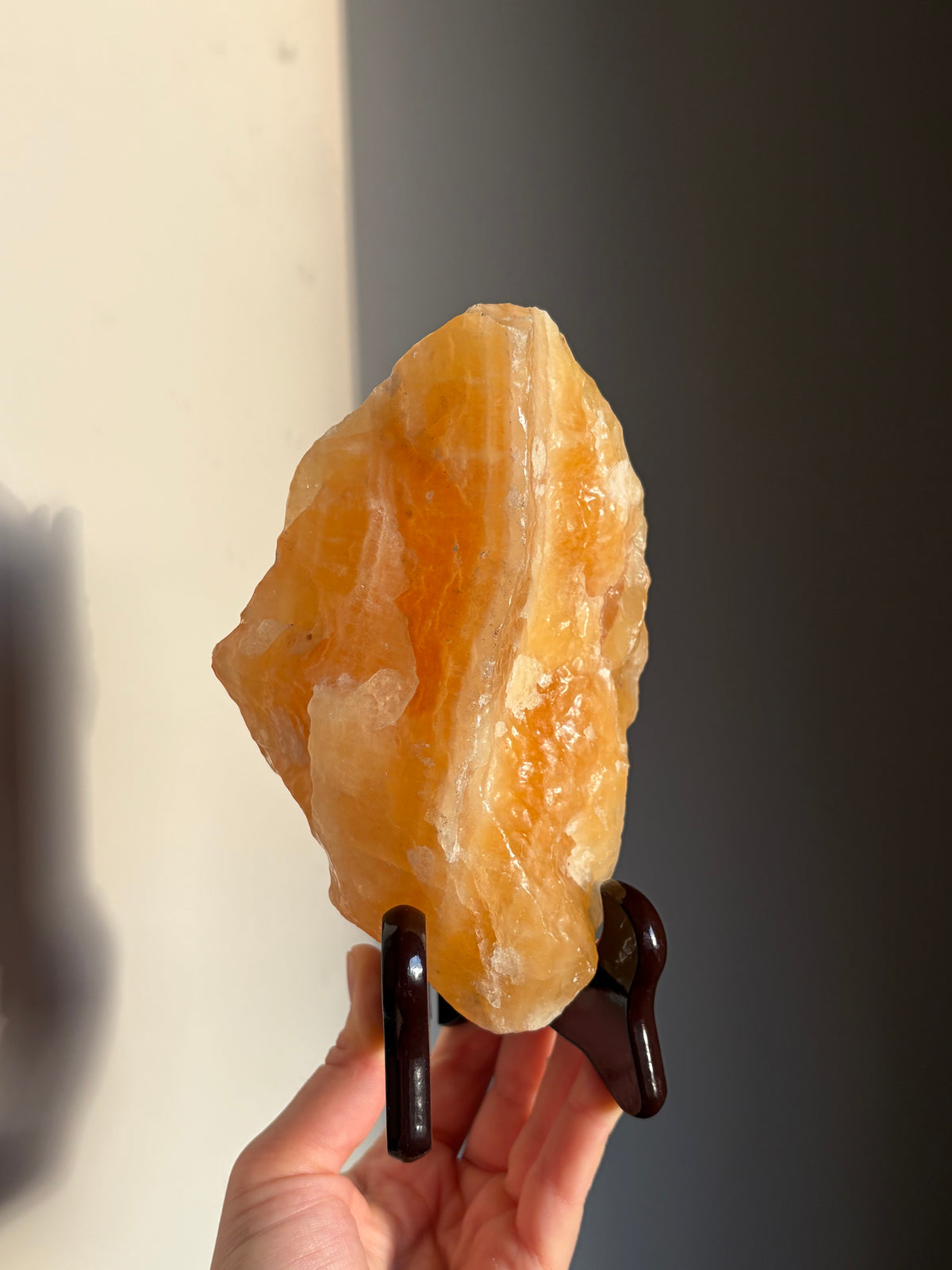 760g Raw Polished Yellow Calcite on stand